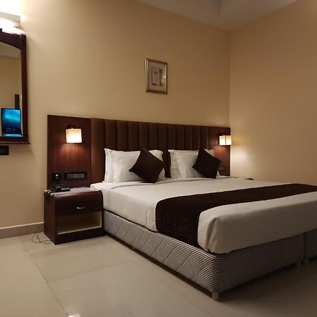Hotel Arcadia Kottayam Esterno foto