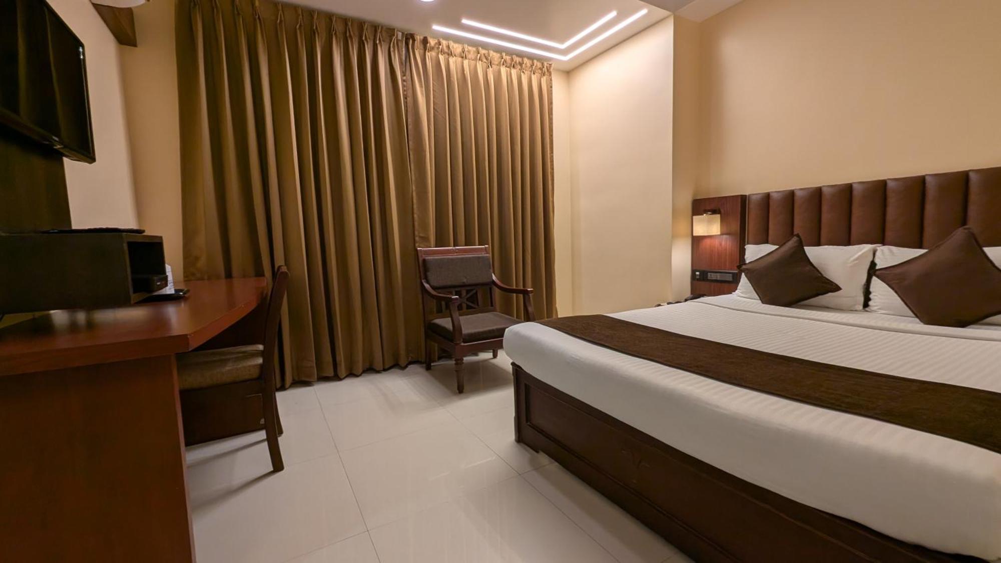 Hotel Arcadia Kottayam Esterno foto